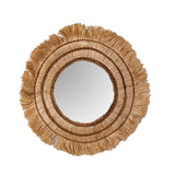 Handcrafted seagrass mirror with a unique woven pattern, perfect for adding natural elegance to any room.