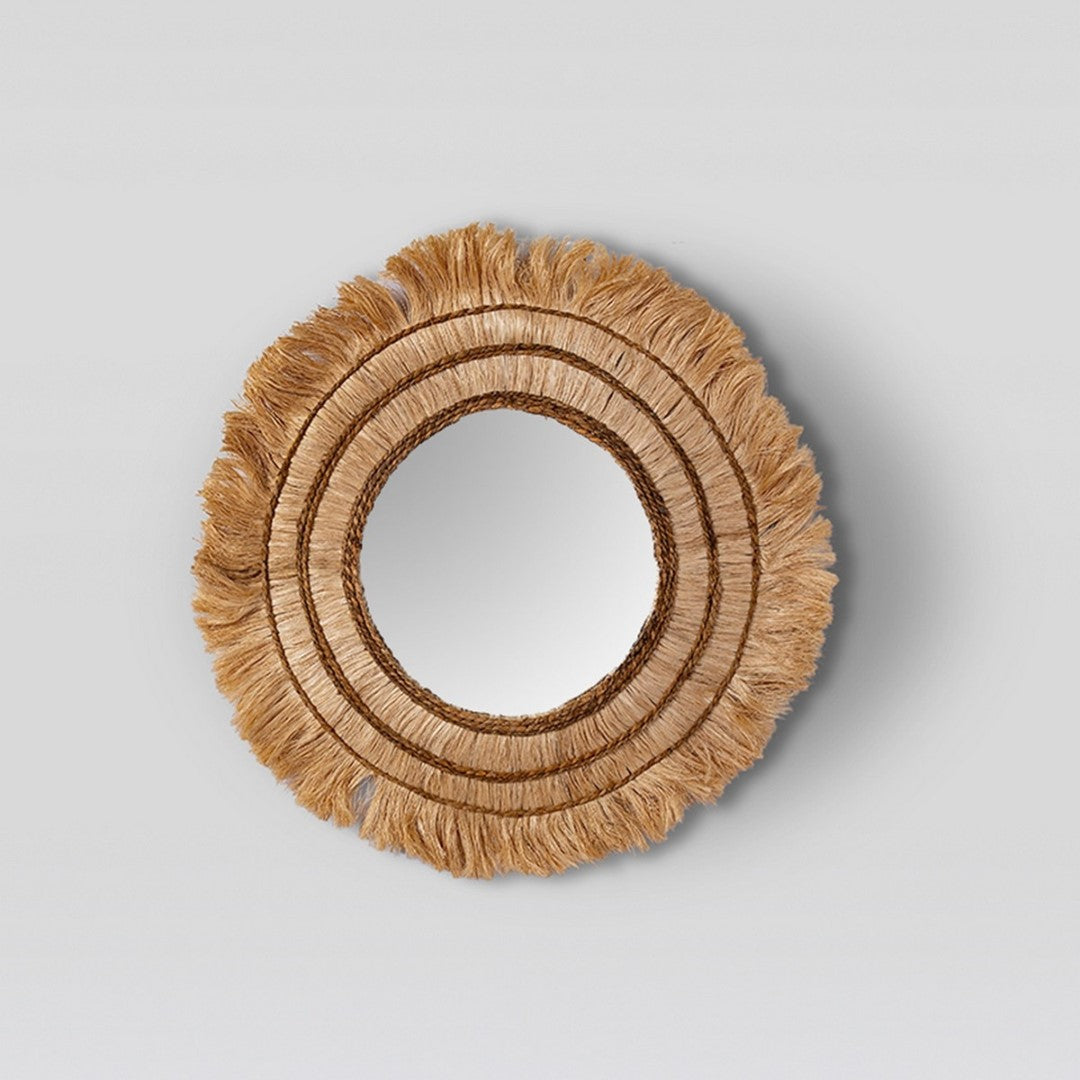 Handcrafted natural seagrass mirror with a woven design, ideal for enhancing any room's decor and atmosphere.