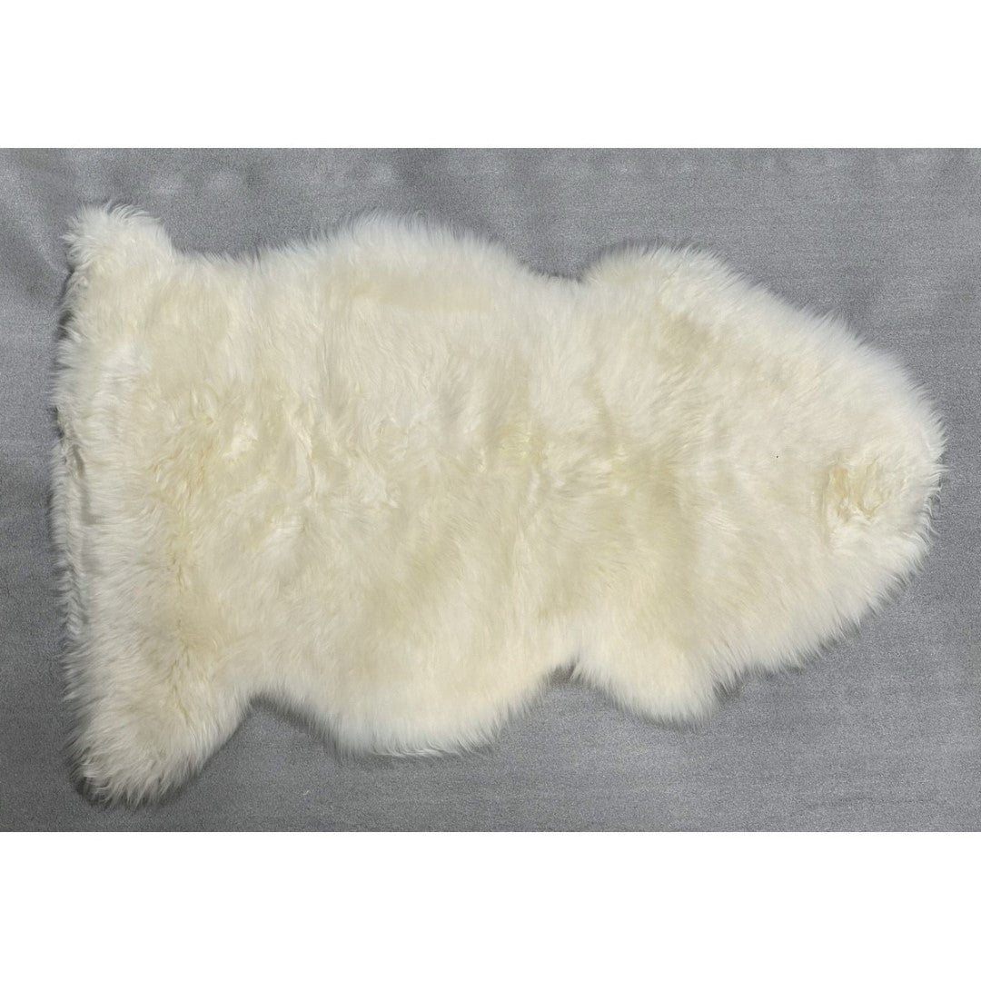 Ivory Kaikoura long wool sheepskin, 60x90cm, adds warmth and luxury to any space with its soft, high-quality material.