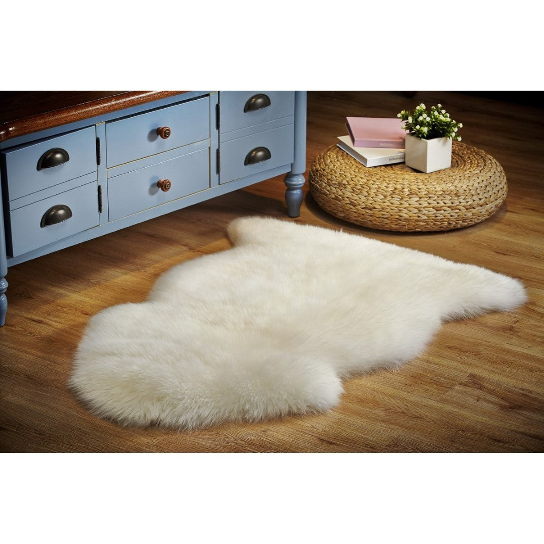 Luxurious ivory Kaikoura long wool sheepskin, perfect for draping or adding warmth to any space, measuring 60x90cm.