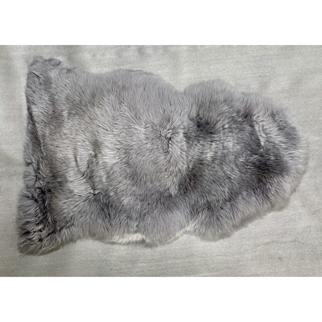 Soft grey Kaikoura Long Wool NZ Sheepskin rug, 60 x 90 cm, perfect for draping or adding warmth to your home decor.