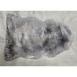 Soft grey Kaikoura Long Wool NZ Sheepskin rug, 60 x 90 cm, perfect for draping or adding warmth to your home decor.