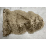 Kaikoura Long Wool NZ Sheepskin rug in taupe, 60x90cm, offering softness and warmth for elegant home decor.