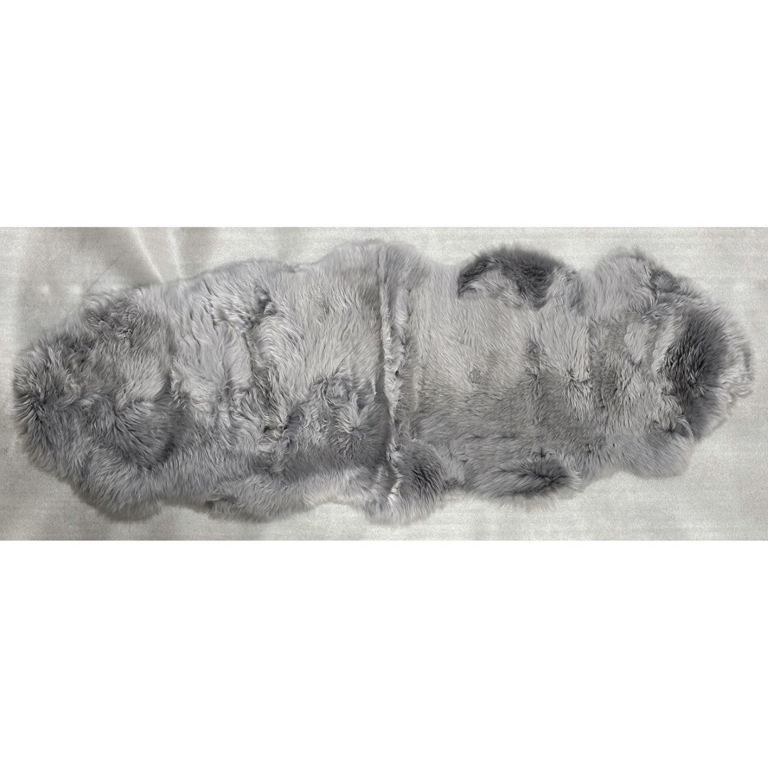 Kaikoura Long Wool Double NZ Sheepskin rug in grey, 60cm x 1.8m, offers luxurious softness and warmth for stylish home decor.