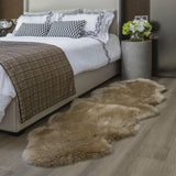 Luxurious taupe long wool double sheepskin rug, ideal for enhancing comfort and elegance in any room.