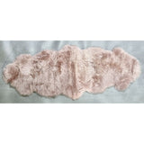 Luxurious rose-colored double NZ sheepskin rug (60cm x 1.8m) offering exceptional softness and warmth for any decor.