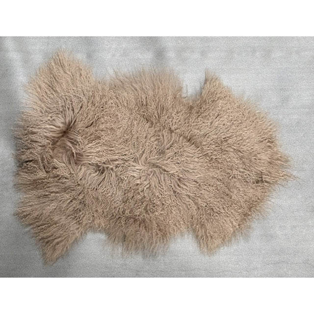 Luxurious Tibetan Long Wool Sheepskin rug in camel, 60x90cm, perfect for adding comfort and style to any space.