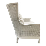 Antique white rattan relax chair with luxurious fabric cushion, perfect for stylish comfort in any living space.