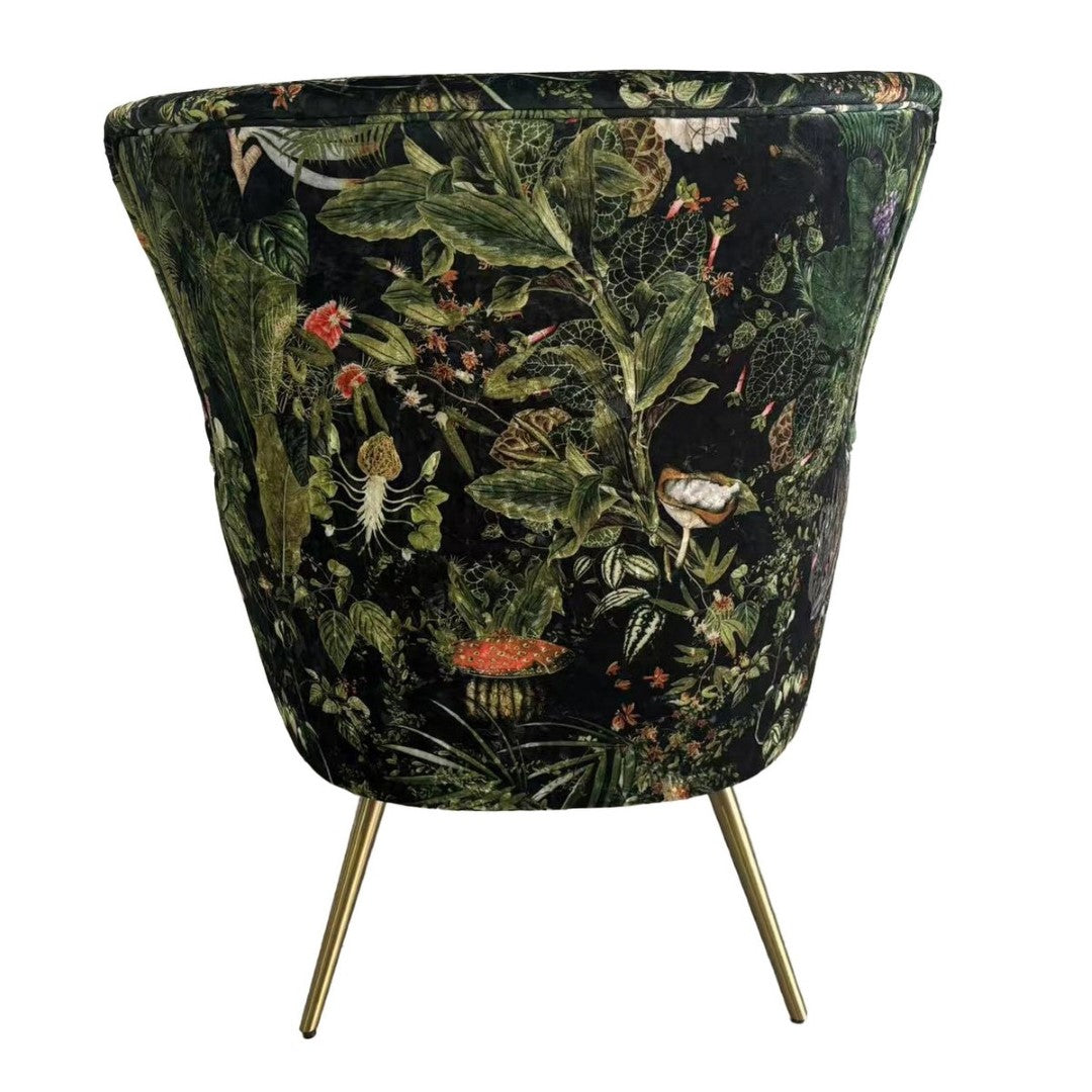 Botanical occasional chair featuring plush velvet, solid timber frame, and antique brass legs, perfect for adding wild elegance.