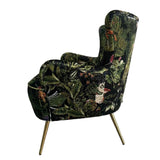 Botanical Occasional Chair featuring a nature-inspired print, plush velvet upholstery, and antique brass legs for stylish comfort.