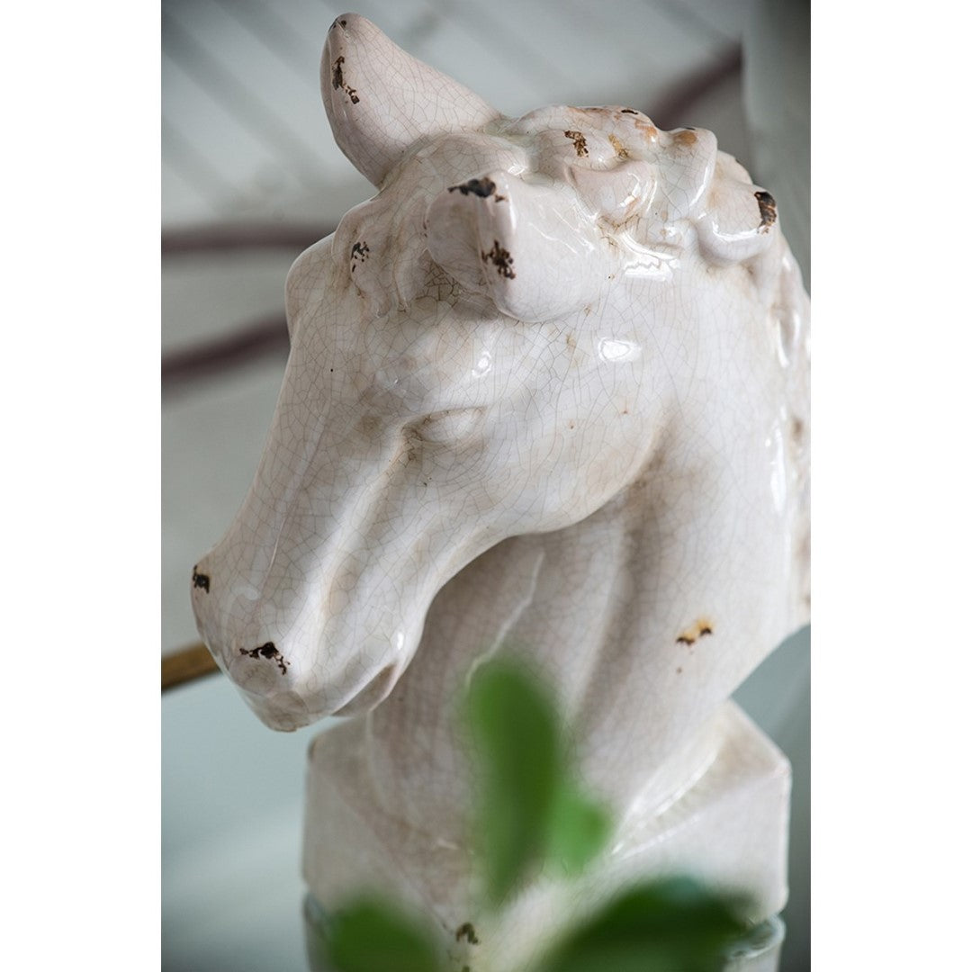 Elegant ceramic horse statue (26.6x15.2x40.6cm) adds sophistication and charm to any decor space. Perfect for equestrian enthusiasts.