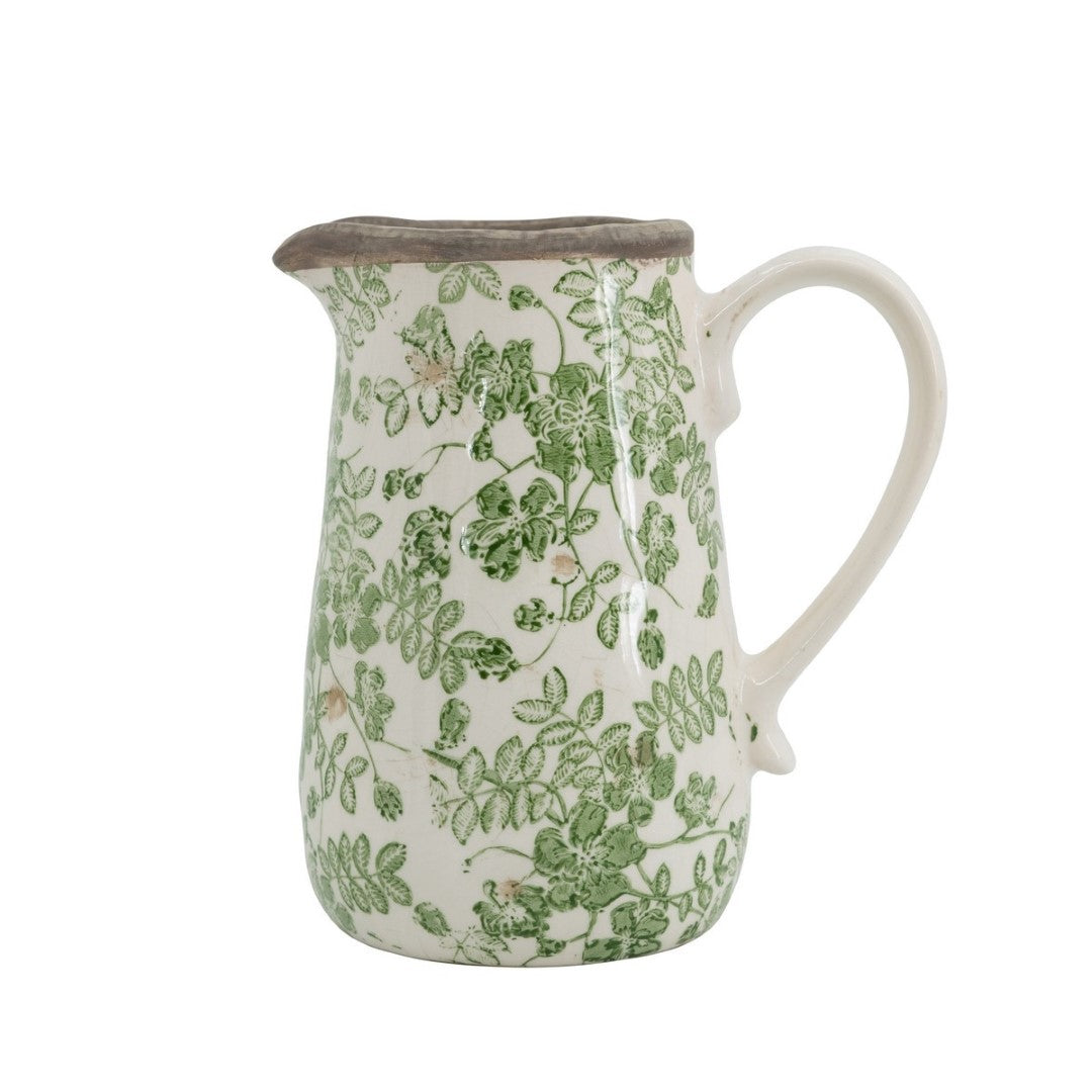 Ceramic flower pitcher in green and white, perfect for displaying flowers or as a stylish water pitcher.