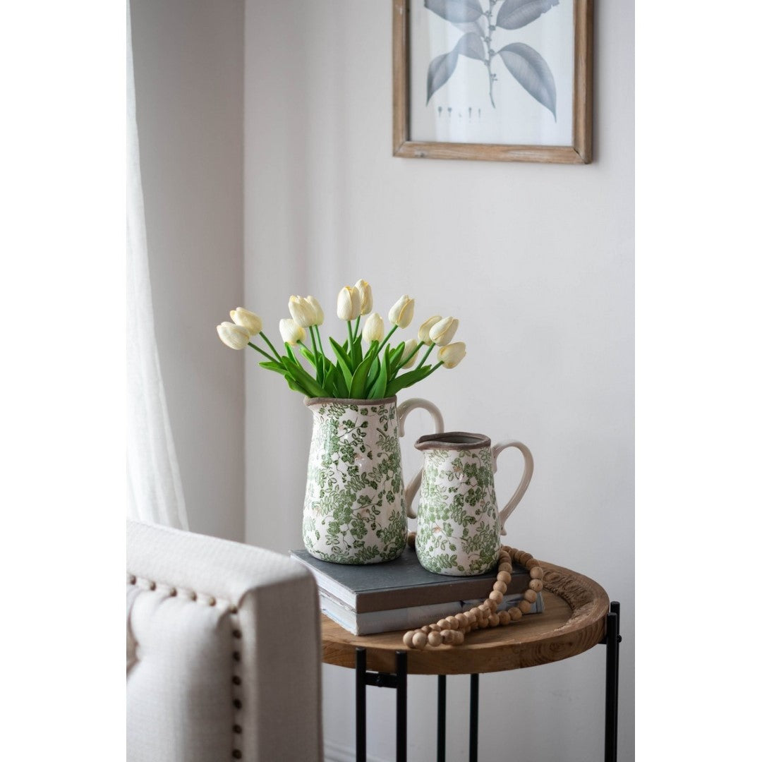 Elegant ceramic flower pitcher in rustic green and white, perfect for fresh or faux flowers, elevating home decor.