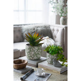 Elegant green and white ceramic flower vase (18.5cm) perfect for showcasing fresh or artificial blooms in any decor.