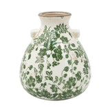 Stylish green and white ceramic vase, perfect for displaying floral arrangements and enhancing home decor elegance.