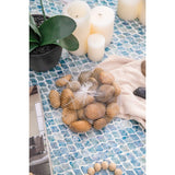 Polished amber pebbles in a 5lbs pack, perfect for home decor and landscaping with a sleek, shiny finish.