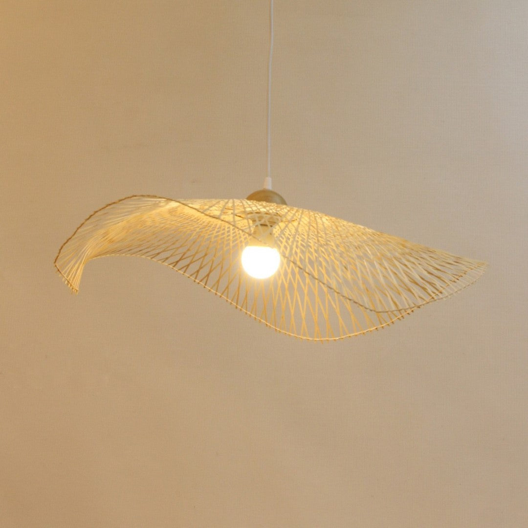 Natural bamboo pendant light with minimalist design, perfect for creating warm, inviting spaces in homes.