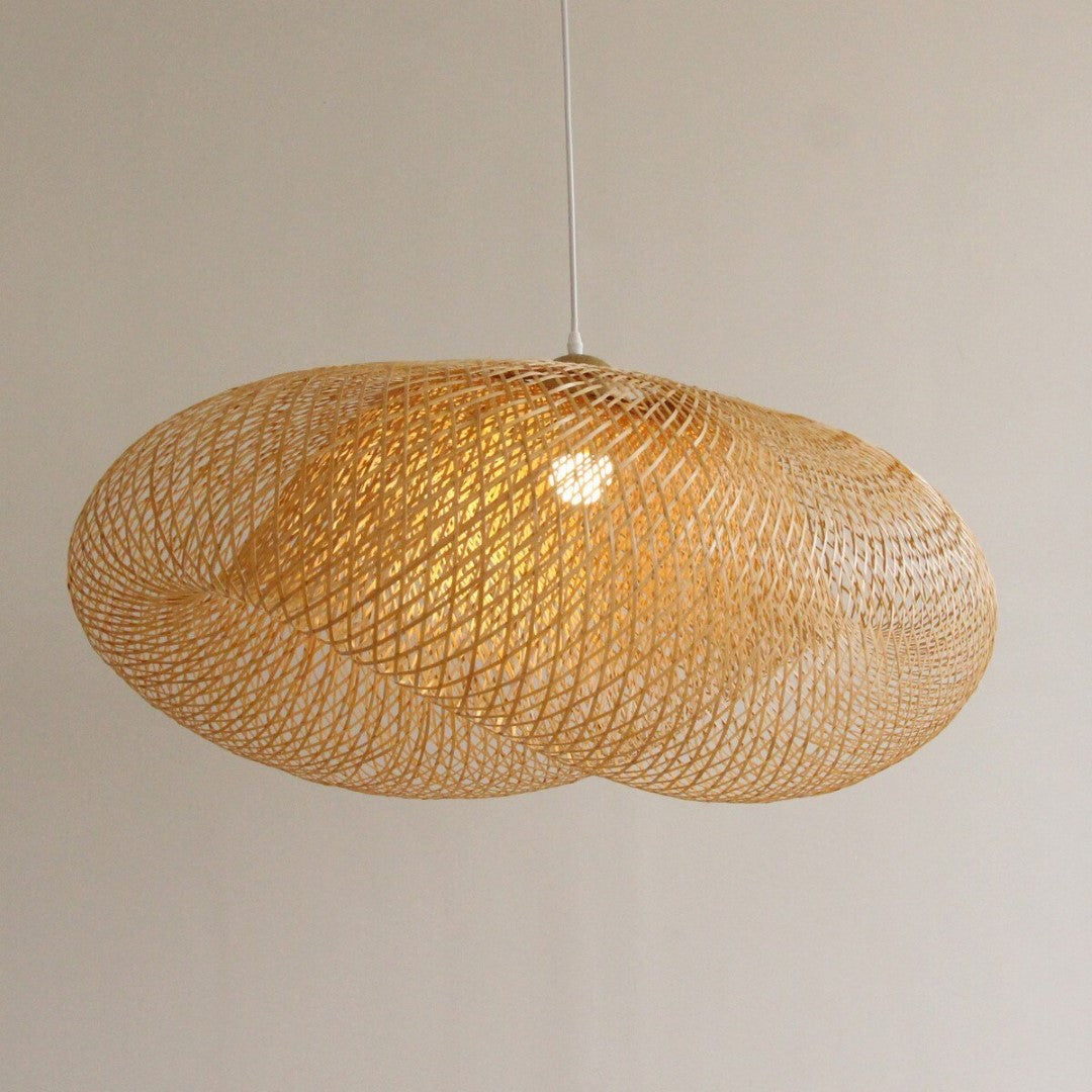 Natural bamboo pendant light with minimalist design, perfect for adding warmth and style to modern interiors.