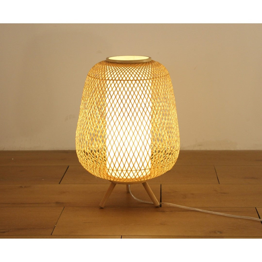 Elegant bamboo floor lamp standing 60 cm tall, providing warm light and organic charm for various interior styles.