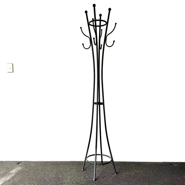 Stylish coat stand measuring 31 x 31 x 103cm, featuring multiple hooks for organized outerwear in any entryway.