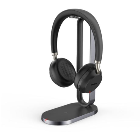 Yealink BH72 Teams Bluetooth dual headset in black with charging stand, featuring leather cushions and dual busylight for productivity.