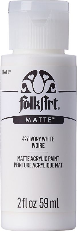 Folk Art Acrylic Paint in Ivory White, 2oz, perfect for arts and crafts with excellent coverage and versatile use on various surfaces.