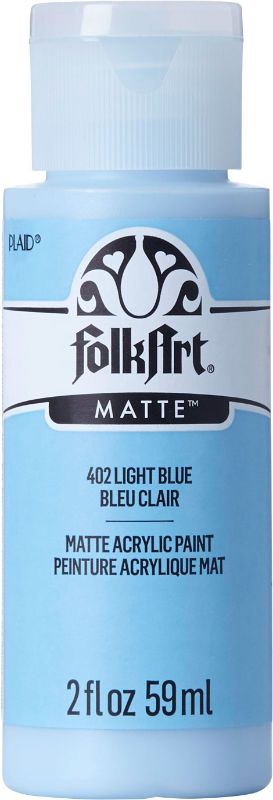 Light blue 2oz acrylic paint by Folk Art, ideal for crafting and painting on various surfaces with creamy consistency.