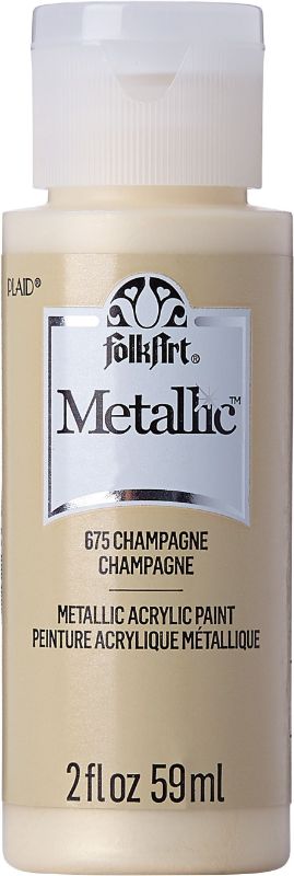 Folk Art Acrylic Metallic Paint in Champagne, 2oz, adds luxurious shimmer for DIY crafts on various surfaces.