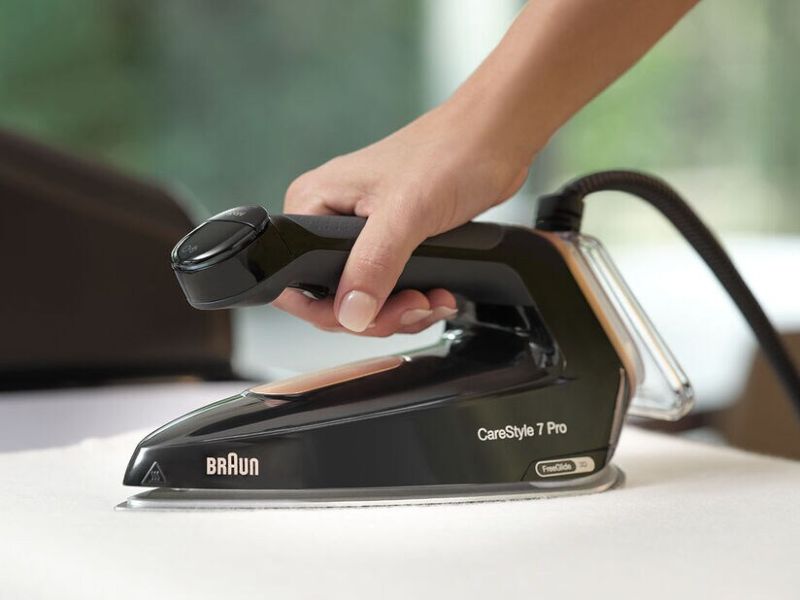 Braun Carestyle Pro Steam Generator Iron Station with FreeGlide soleplate, large water tank, and four steam modes for versatile fabric care.