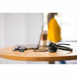 HP Poly Voyager 4320 UC headset with wireless connectivity, noise-canceling mic, and stereo sound for seamless video conferencing.