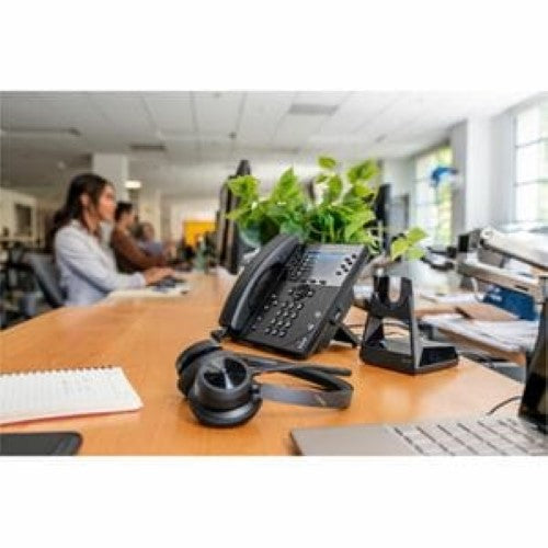 HP Poly Voyager 4320 UC headset with wired/wireless connectivity, noise-canceling mic, and superior audio quality for seamless communication.