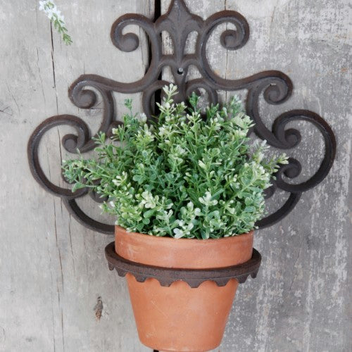 Elegant cast iron flowerpot holder (29.8 x 31.7cm) for showcasing plants, complementing any decor with durable support.