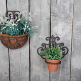 Elegant cast iron flowerpot holder, 29.8 x 31.7cm, perfect for showcasing plants in any decor style.