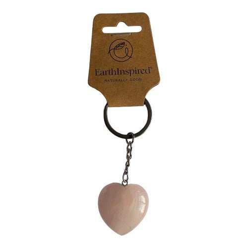 Set of 3 rose quartz heart keyrings on stainless steel, promoting love and positivity.