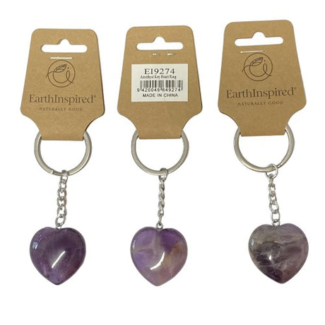 Set of 3 amethyst heart keyrings on stainless steel, promoting positivity and emotional balance.