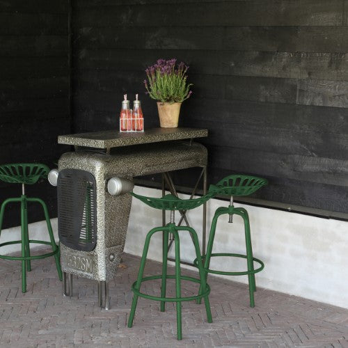 Green Tractor Bar Stool featuring vintage design, height adjustment, sturdy metal construction, and built-in footrest for comfort.