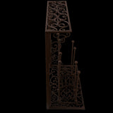 Large cast iron boot rack (34x63x78cm) with decorative design, middle scraper, and space for four pairs of boots.