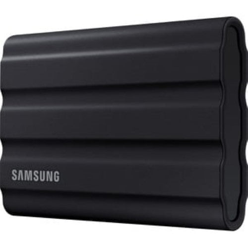 Portable Samsung T7 Shield 4TB SSD in black, featuring rugged IP65 design, 1050 MB/s transfer speed, and compatibility with multiple devices.