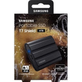 Samsung T7 Shield 4TB portable SSD in black, featuring rugged design, IP65 rating, and high-speed USB 3.2 connectivity.