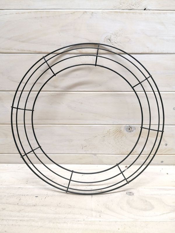 Sleek 35cm round black metal frame for showcasing photos and art, adding modern elegance to any decor style.