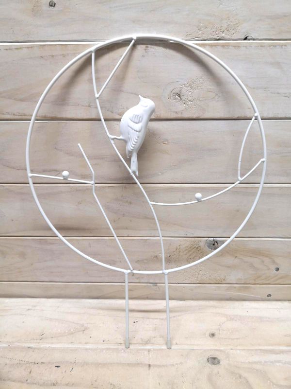 Round metal garden stake featuring a whimsical bird design, perfect for supporting plants and enhancing outdoor decor.