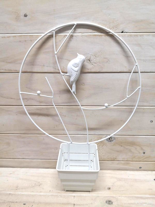 Round metal support stake featuring a playful bird design, perfect for garden decor and plant support.