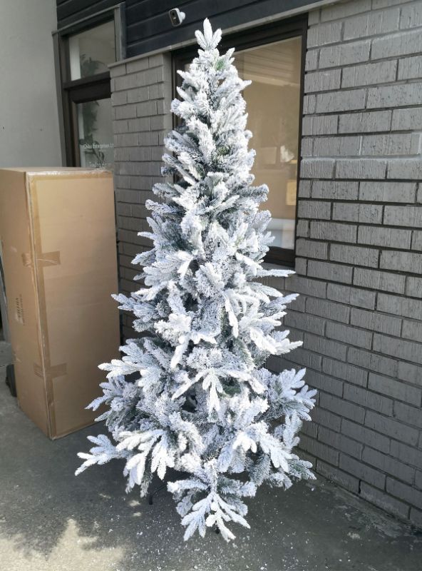 Realistic 6.5 ft Mixed Pine Snowy Christmas Tree, perfect for festive decor with a charming winter wonderland look.