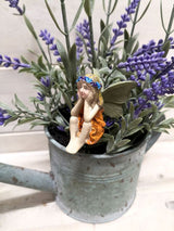 Set of 6 whimsical fairy picks with intricate designs for garden decor, flower beds, or party decorations.