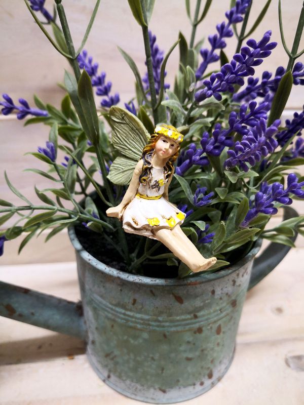 Set of 6 whimsical fairy picks for garden decor, crafted from durable materials to elevate festive outdoor celebrations.