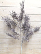 Lifelike Rime Grass Spray in Grey, perfect for low-light decor, adding vibrant greenery without maintenance hassles.