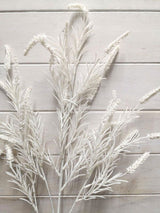 Artificial white caterpillar grass spray, vibrant and lifelike, perfect for enhancing decor without maintenance.