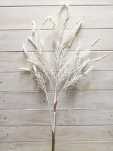 Artificial white caterpillar grass spray, vibrant and lifelike, perfect for low-light spaces and maintenance-free decor.