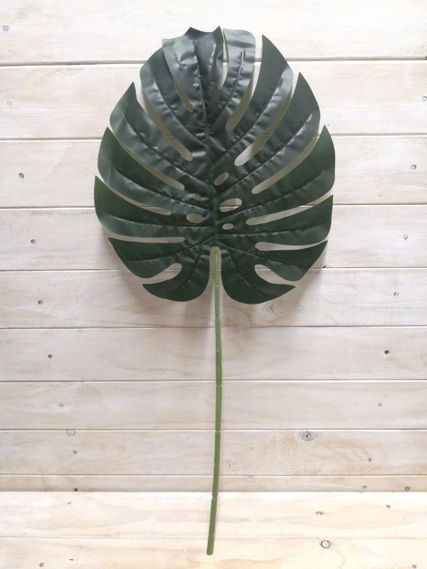 Lifelike 34*30cm artificial Monstera leaf, perfect for enhancing decor with maintenance-free tropical greenery.