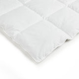 Logan & Mason single duvet inner featuring 50% down and 50% feather for breathable warmth and plush comfort.